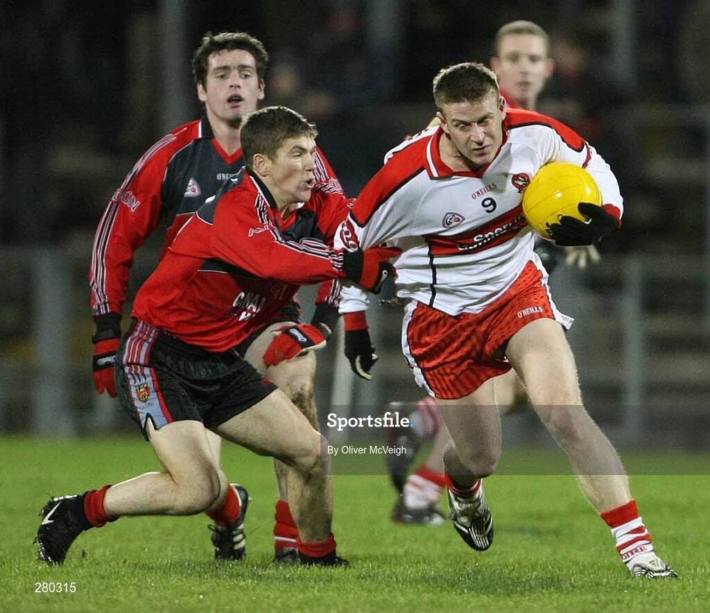 26 January 2008; Aidan McElhone, Derry, in action against Ronan Sexton, Down. Dr. McKenna Cup Final, Derry v Down, Casement Park, Belfast, Co. Antrim. Picture credit: Oliver McVeigh / SPORTSFILE