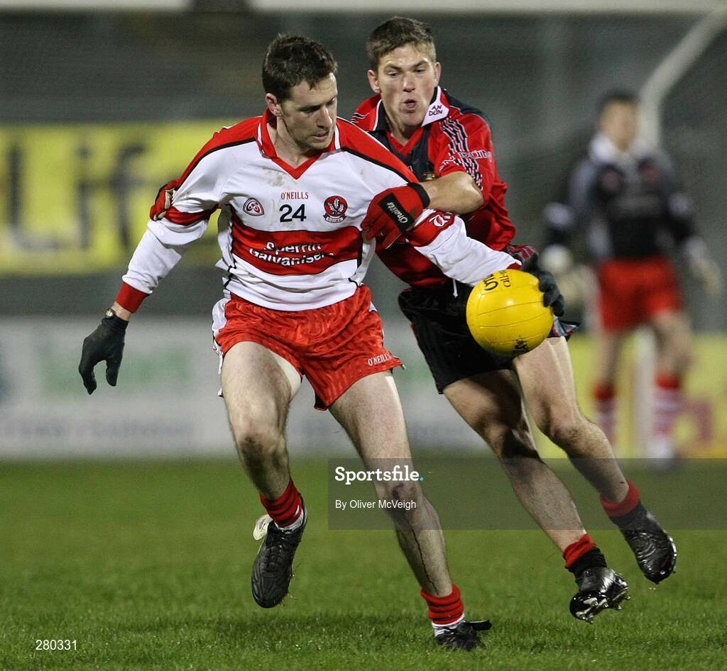 26 January 2008; Enda Muldoon, Derry, in action against Ronan Sexton, Down. Dr. McKenna Cup Final, Derry v Down, Casement Park, Belfast, Co. Antrim. Picture credit: Oliver McVeigh / SPORTSFILE