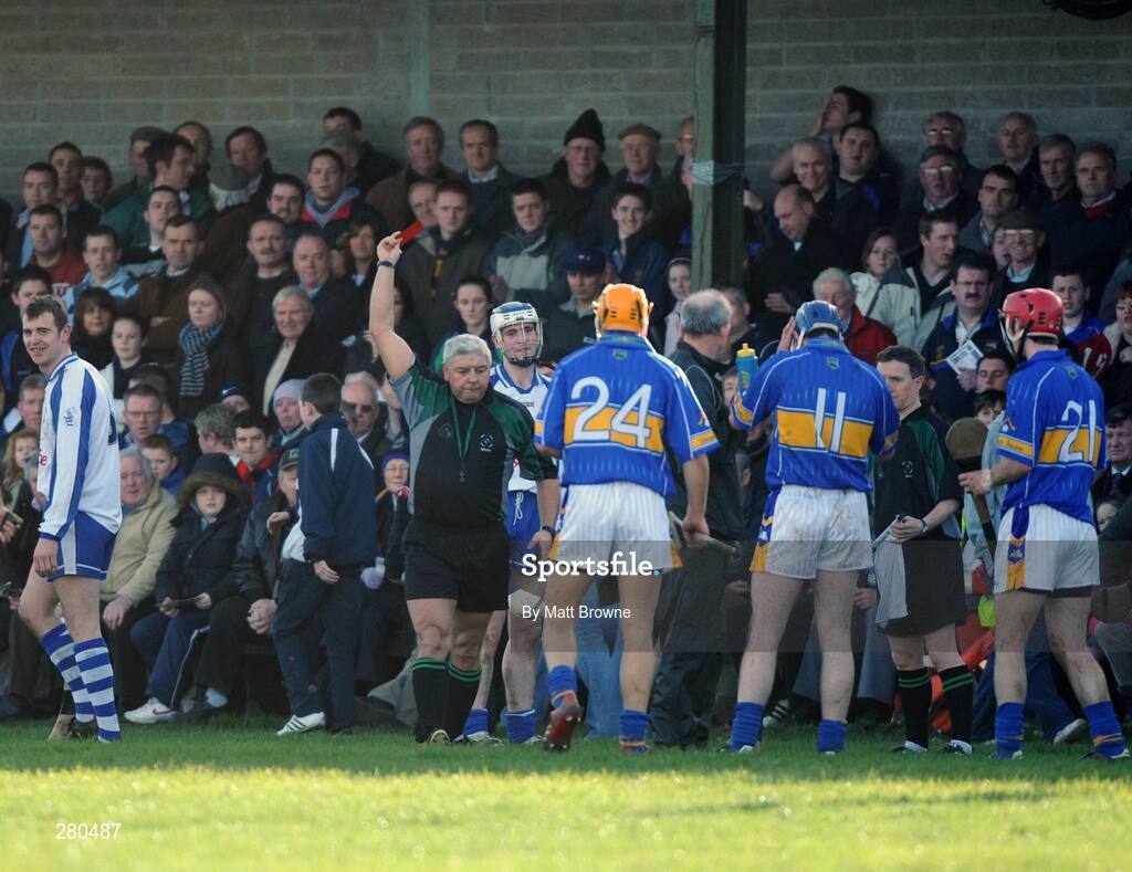 27 January 2008; Wayne Hutchinson, Waterford, is sent off by referee Seanie McMahon. Waterford Crystal Cup Final, Tipperary v Waterford, JK Brackens GAA Club, Templemore, Co. Tipperary. Picture credit; Matt Browne / SPORTSFILE