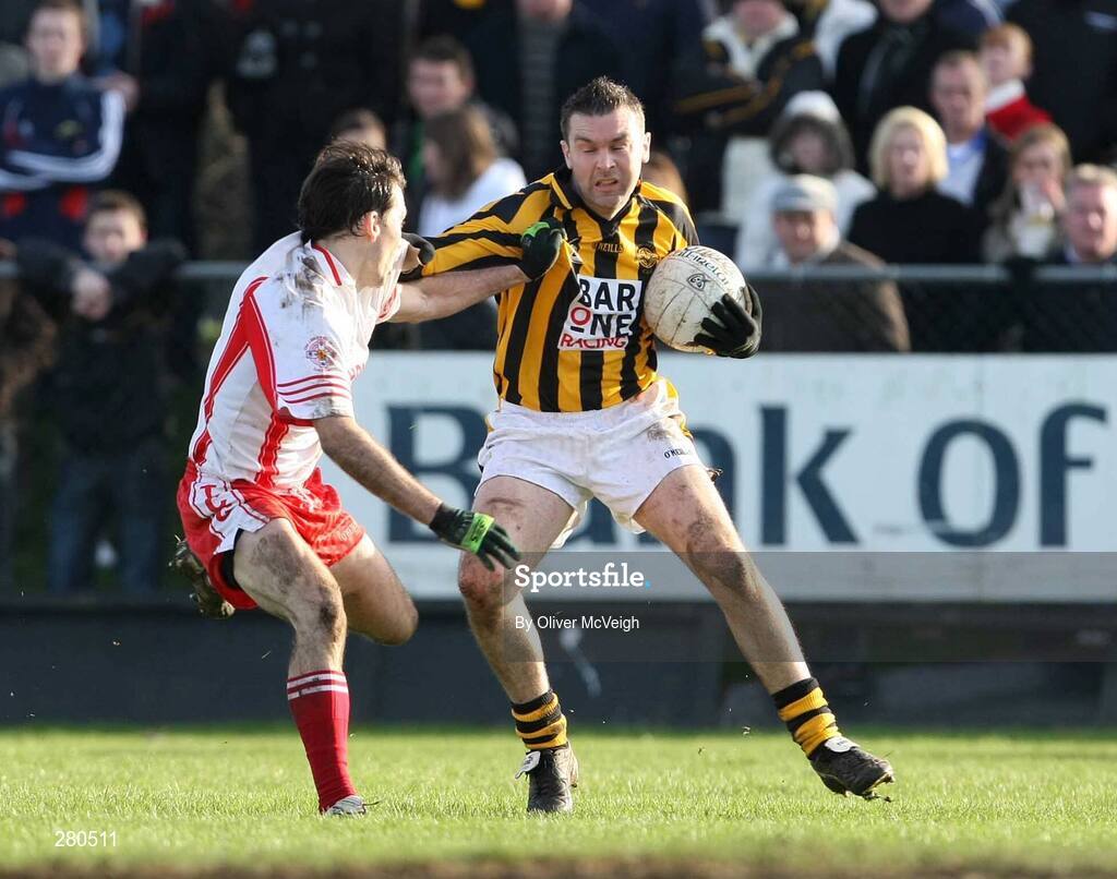 27 January 2008; Oisin McConville, Crossmaglen Rangers,  in action against Hughie Cunningham, Tir Chonaill Gaels. AIB All-Ireland Club Football Championship Quarter-Final, Tir Chonaill Gaels v Crossmaglen Rangers, Emerald Gaelic Grounds, Ruislip, London, England. Picture credit: Oliver McVeigh / SPORTSFILE