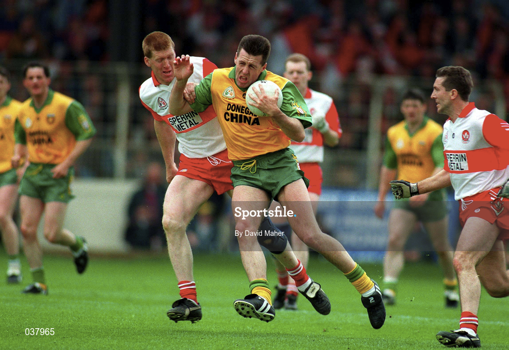 14 May 1995; Brian Murray of Donegal in action against Brian McGilligan of Derry during the Church & General National Football League Final match between Derry and donegal at Croke Park in Dublin. Photo by David Maher/Sportsfile