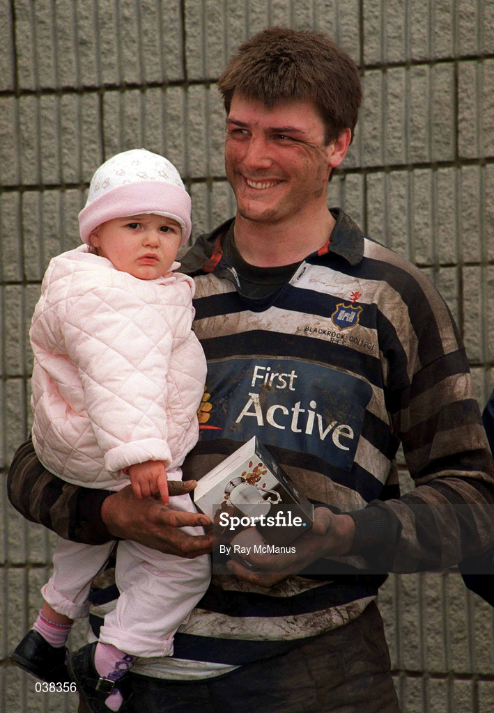 29 April 2000; Blackrock's Hubie Kos, with his daughter Robyn, age 18 months, following the AIB All-Ireland League Division 2 match between Blackrock College and Old Crescent at Stradbrook Road in Dublin. Photo by Ray McManus/Sportsfile