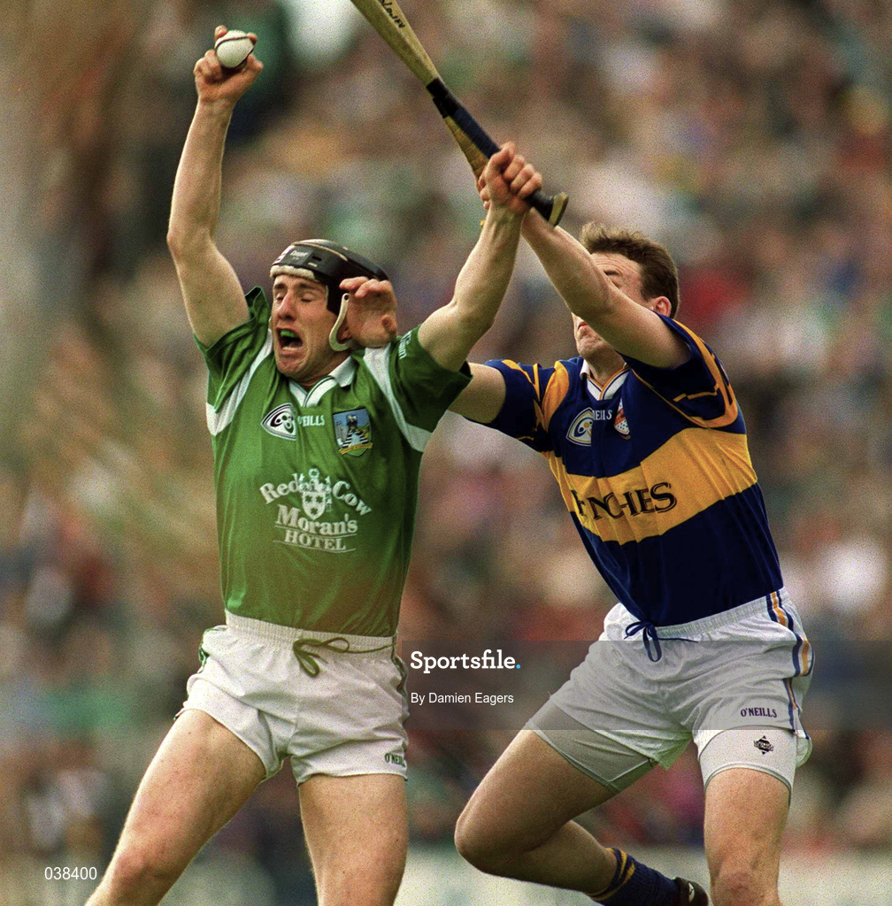 30 April 2000; James Moran of Limerick in action against Liam Cahill of Tipperary during the Church & General National Hurling League Division 1 Semi-Final match between Tipperary and Limerick at Semple Stadium in Thurles, Tipperary. Photo by Damien Eagers/Sportsfile