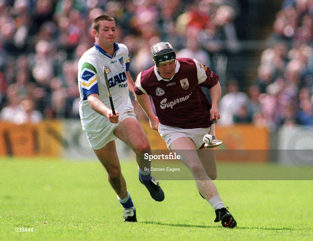 30 April 2000; Joe Cooney of Galway in action against Dan Shanahan of Waterford during the Church & General National Hurling League Division 1 Semi-Final match between Galway and Waterford at Semple Stadium in Thurles, Tipperary. Photo by Damien Eagers/Sportsfile