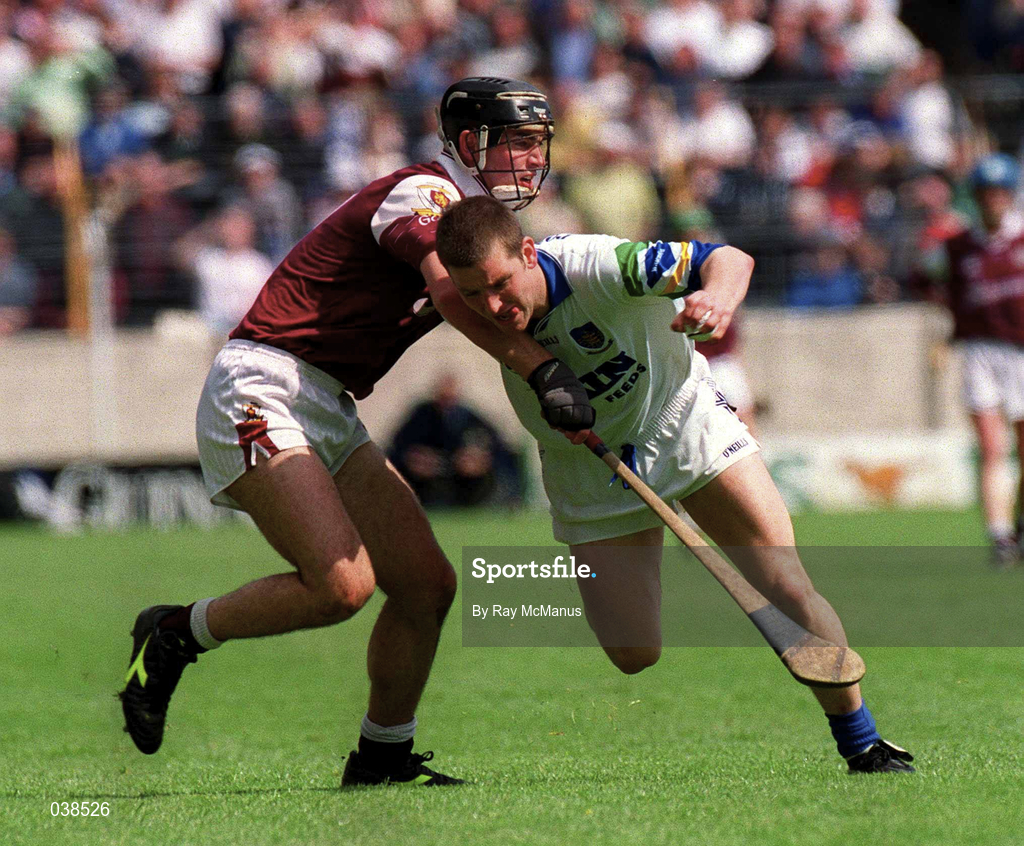 30 April 2000; Ken McGrath of Waterford in action against Cathal Moore of Galway during the Church & General National Hurling League Division 1 Semi-Final match between Galway and Waterford at Semple Stadium in Thurles, Tipperary. Photo by Ray McManus/Sportsfile