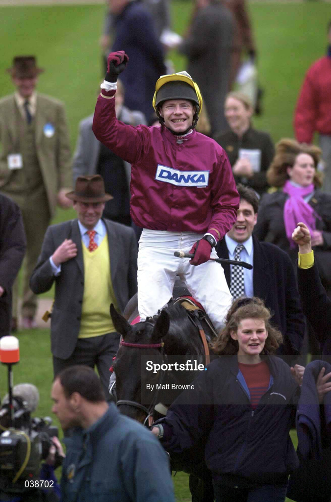 16 March 2000; Jockey Mick Fitzgerald celebrates after winning the Cathcart Challenge Cup Chase on Stormyfairweather during Day Three of the Cheltenham Racing Festival at Prestbury Park in Cheltenham, England. Photo by Matt Browne/Sportsfile