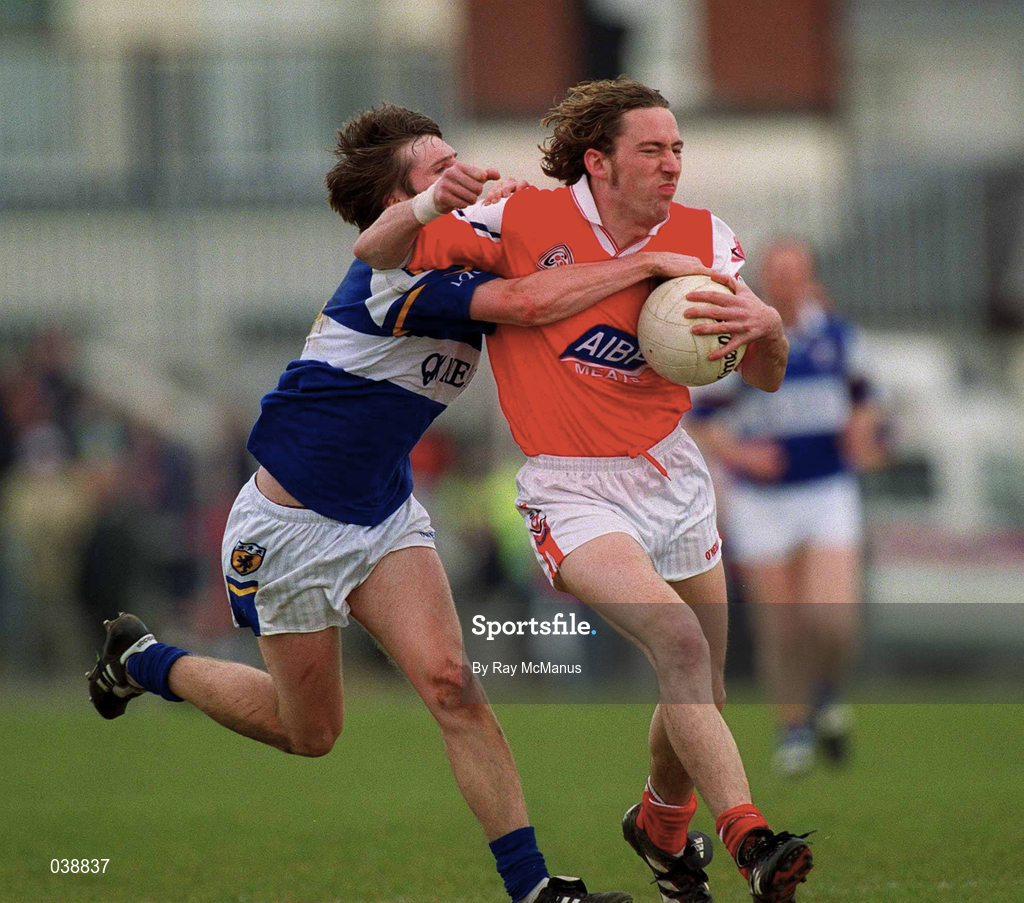23 April 2000; Paddy McGuigan of Louth in action against Colm Parkinson of Laois during the Church & General National Football League Division 2 Semi-Final match between Louth and Laois at Cusack Park in Mullingar, Westmeath. Photo by Ray McManus/Sportsfile