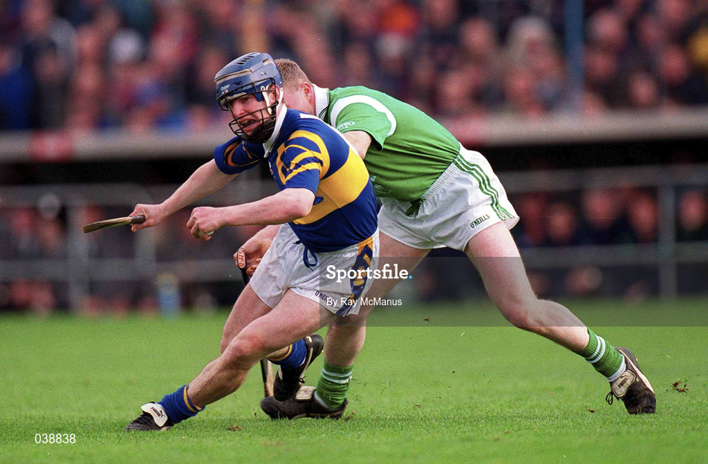 30 April 2000; Paddy O'Brien of Tipperary in action against Stephen McDonagh of Limerick during the Church & General National Hurling League Division 1 Semi-Final match between Tipperary and Limerick at Semple Stadium in Thurles, Tipperary. Photo by Ray McManus/Sportsfile