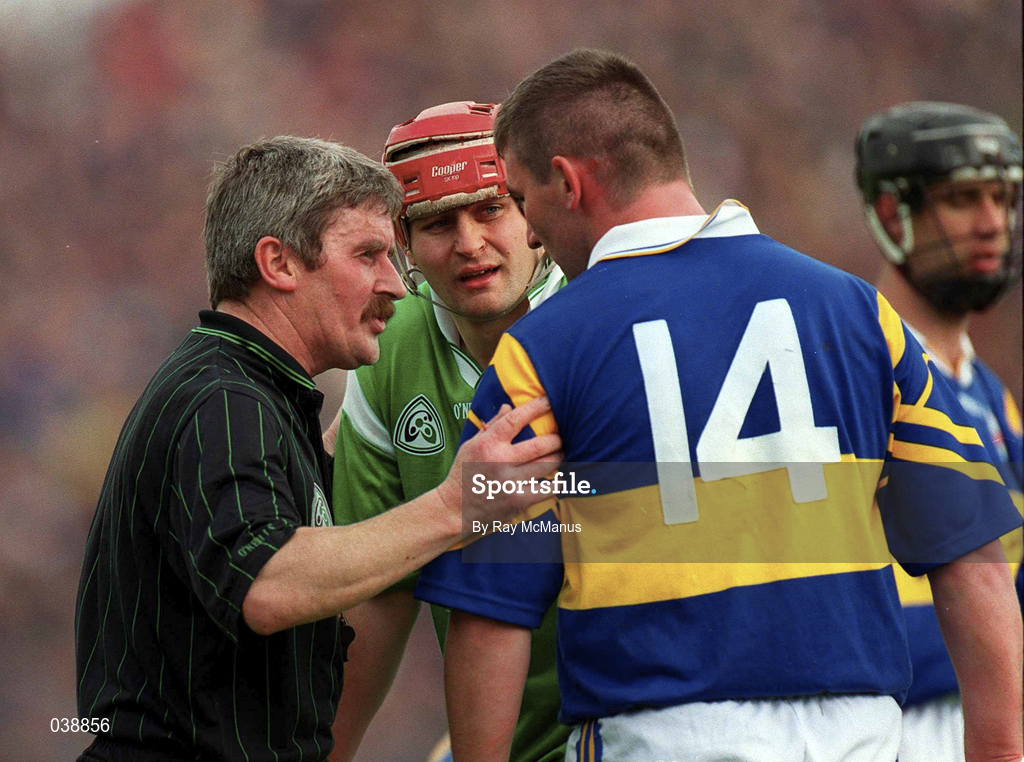 30 April 2000; Referee Pat Horan speaks to Paul Shelly of Tipperary and TJ Ryan of Limerick during the Church & General National Hurling League Division 1 Semi-Final match between Tipperary and Limerick at Semple Stadium in Thurles, Tipperary. Photo by Ray McManus/Sportsfile