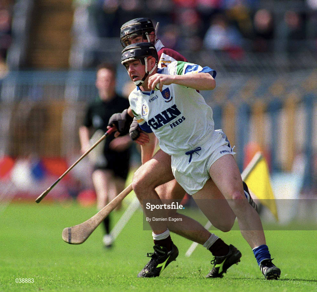 30 April 2000; Paul Flynn of Waterford in action against Cathal Moore of Galway during the Church & General National Hurling League Division 1 Semi-Final match between Galway and Waterford at Semple Stadium in Thurles, Tipperary. Photo by Damien Eagers/Sportsfile