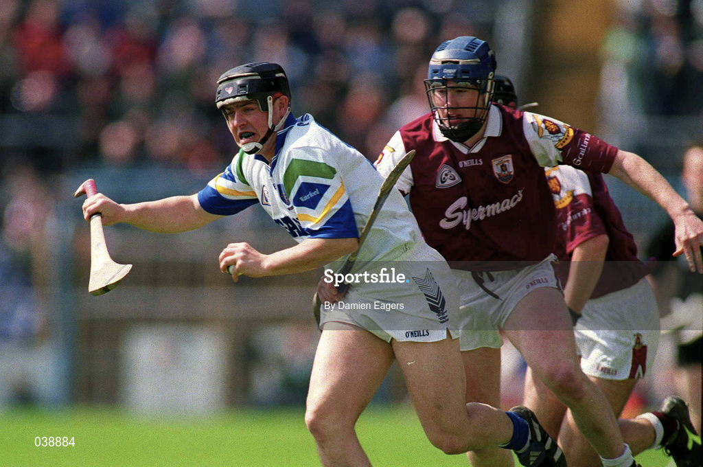 30 April 2000; Paul Flynn of Waterford in action against Liam Hodgins of Galway during the Church & General National Hurling League Division 1 Semi-Final match between Galway and Waterford at Semple Stadium in Thurles, Tipperary. Photo by Damien Eagers/Sportsfile