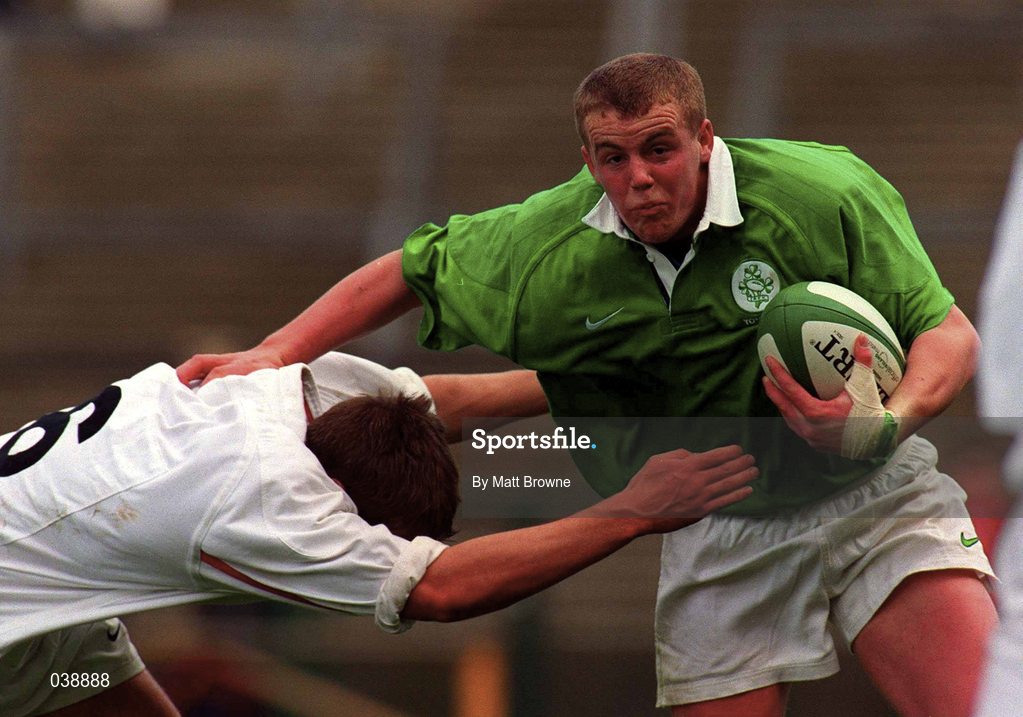 28 April 2000; Alfie Harte of Ireland is tackled by Deacon Brett of England during the 4 Nations U18 Championship match between Ireland and England at Lansdown Road in Dublin. Photo by Matt Browne/Sportsfile