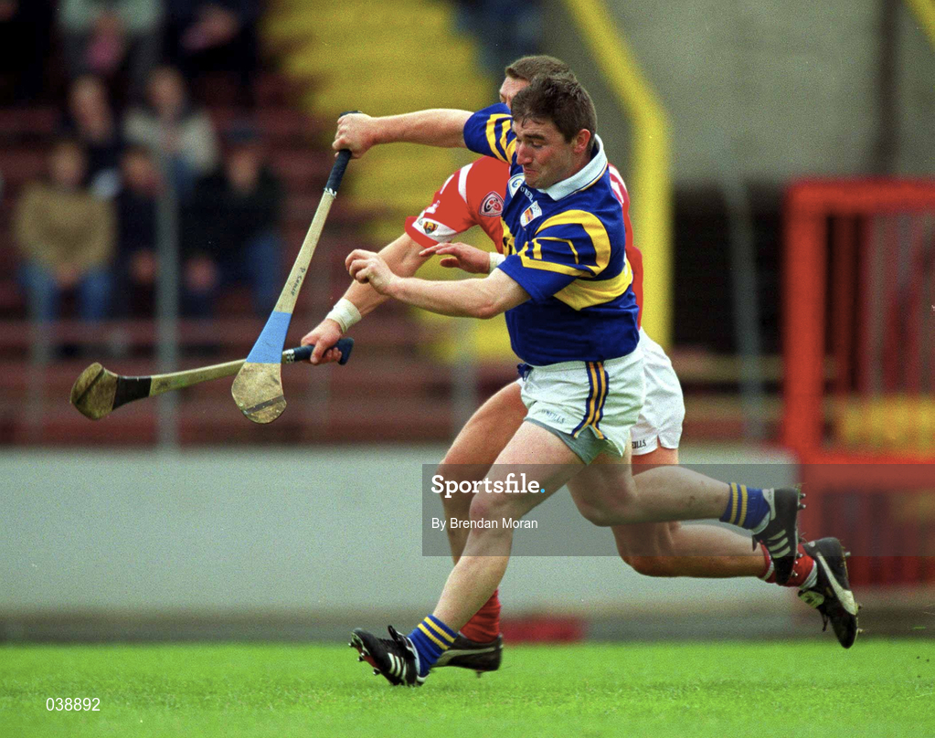 2 April 2000; Paul Shelly of Tipperary in action against Diarmuid O'Sullivan of Cork during the Church & General National Hurling League Division 1B match between Cork and Tipperary at Páirc U’ Chaoimh in Cork. Photo by Brendan Moran/Sportsfile