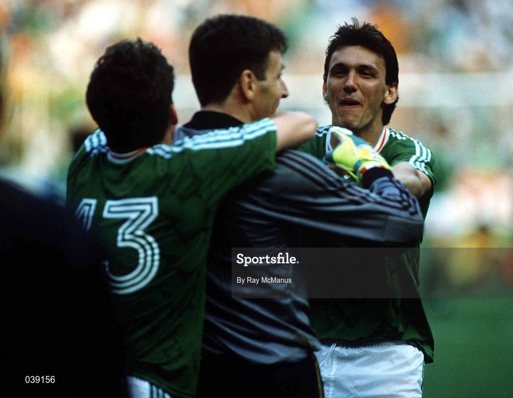 25 June 1990; Tony Cascarino of Republic of Ireland, right, celebrates with team-mates Packie Bonner, centre, and Andy Townsend following of the FIFA World Cup 1990 Round of 16 match between Republic of Ireland and Romania at the Stadio Luigi Ferraris in Genoa, Italy. Photo by Ray McManus/Sportsfile