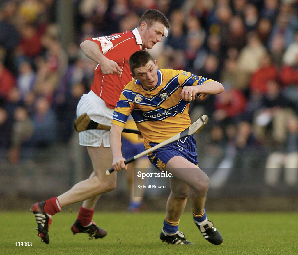 24 April 2004; Diarmuid McMahon of Clare in action against Graham Callina of Cork during the Allianz National Hurling League Group 1 Round 3 match between Cork and Clare at Páirc U’ Rinn in Cork. Photo by Matt Browne/Sportsfile