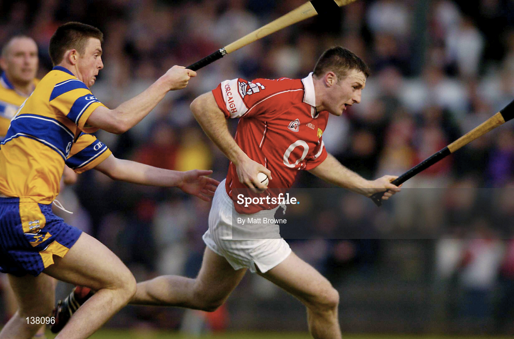 24 April 2004; Graham Callinan of Cork in action against Diarmuid McMahon of Clare during the Allianz National Hurling League Group 1 Round 3 match between Cork and Clare at Páirc U’ Rinn in Cork. Photo by Matt Browne/Sportsfile