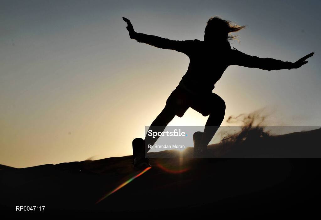30 January 2008; Nollaig Cleary, Cork, enjoys the sandboarding during a Safari Trip. O'Neills/TG4 Ladies Gaelic Football All Star Tour 2007, Dubai, United Arab Emirates. Picture credit: Brendan Moran / SPORTSFILE  *** Local Caption ***