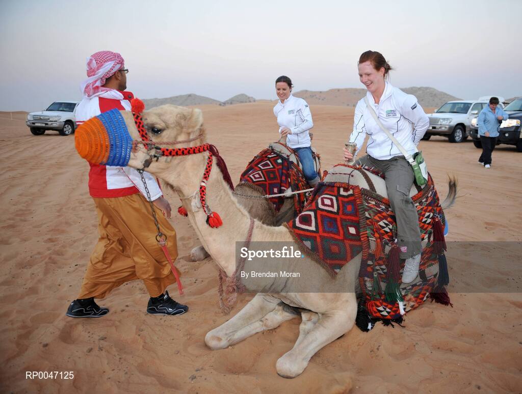 28 January 2008; Brianne Leahy, centre, Kildare, and Caoimhe Marley, Armagh, try out some camel rides during a Safari Trip. O'Neills/TG4 Ladies Gaelic Football All Star Tour 2007, Dubai, United Arab Emirates. Picture credit: Brendan Moran / SPORTSFILE  *** Local Caption ***