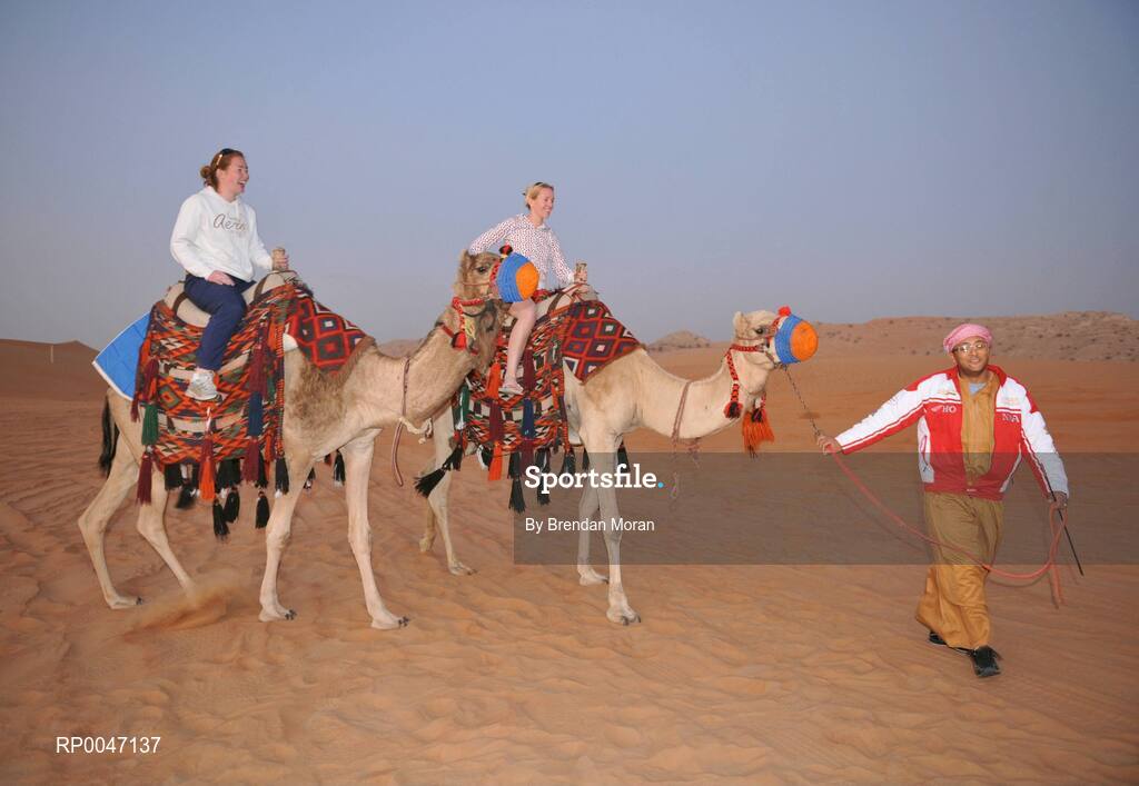 28 January 2008; Cork footballers Rena Buckley, left, and Nollaig Cleary try out some camel rides during a Safari Trip. O'Neills/TG4 Ladies Gaelic Football All Star Tour 2007, Dubai, United Arab Emirates. Picture credit: Brendan Moran / SPORTSFILE  *** Local Caption ***