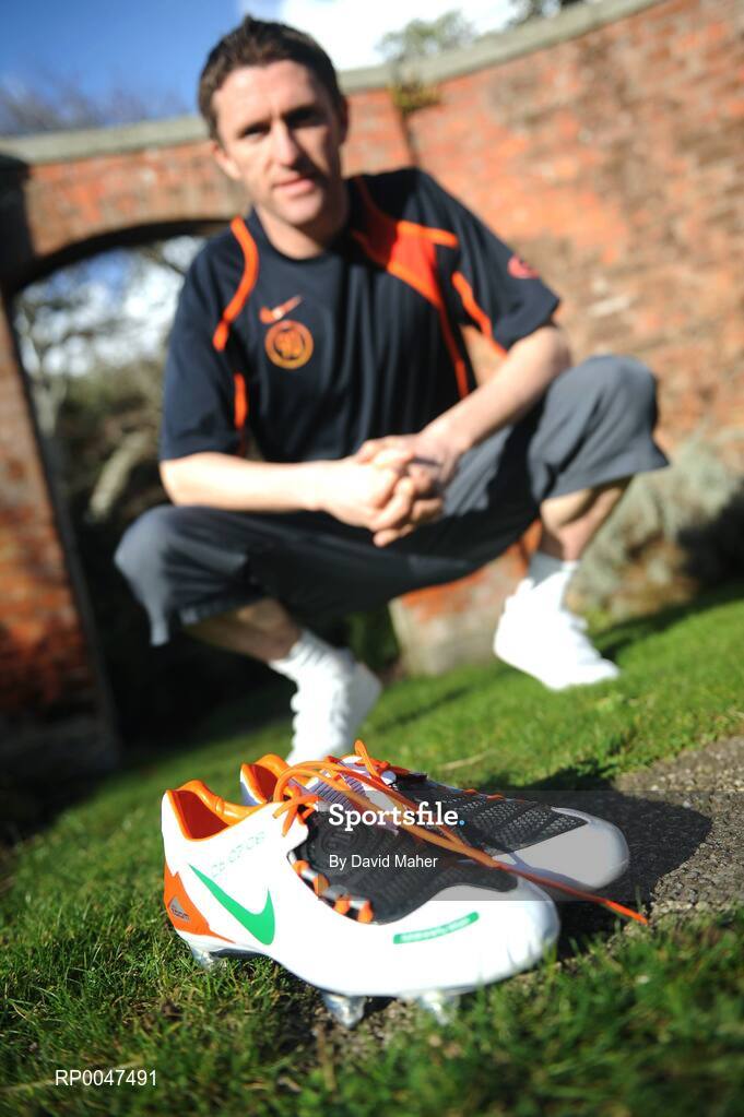 4 February 2008; Republic of Ireland captain Robbie Keane pictured with a pair of specially commissioned Republic of Ireland coloured Nike Total 90 Laser football boots which he will wear against Brazil on Wednesday the 6 February 2008. Portmarnock, Dublin. Picture credit: David Maher / SPORTSFILE