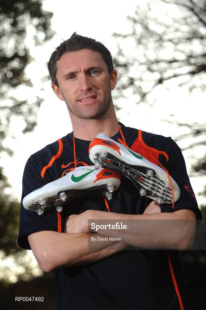 4 February 2008; Republic of Ireland captain Robbie Keane pictured with a pair of specially commissioned Republic of Ireland coloured Nike Total 90 Laser football boots which he will wear against Brazil on Wednesday the 6 February 2008. Portmarnock, Dublin. Picture credit: David Maher / SPORTSFILE