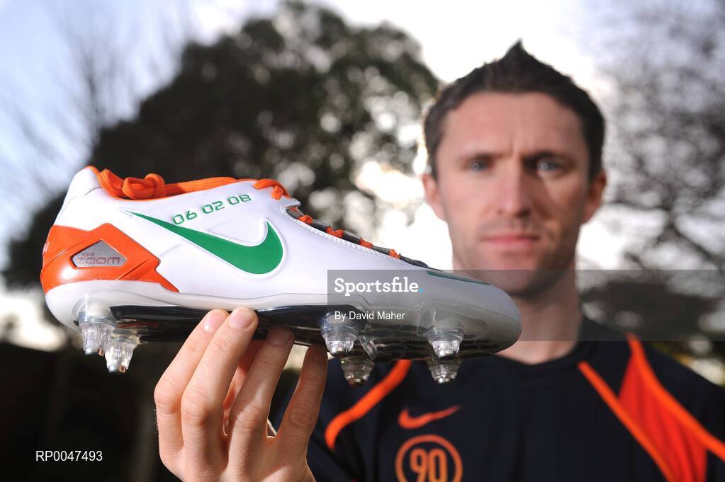 4 February 2008; Republic of Ireland captain Robbie Keane pictured with a pair of specially commissioned Republic of Ireland coloured Nike Total 90 Laser football boots which he will wear against Brazil on Wednesday the 6 February 2008. Portmarnock, Dublin. Picture credit: David Maher / SPORTSFILE