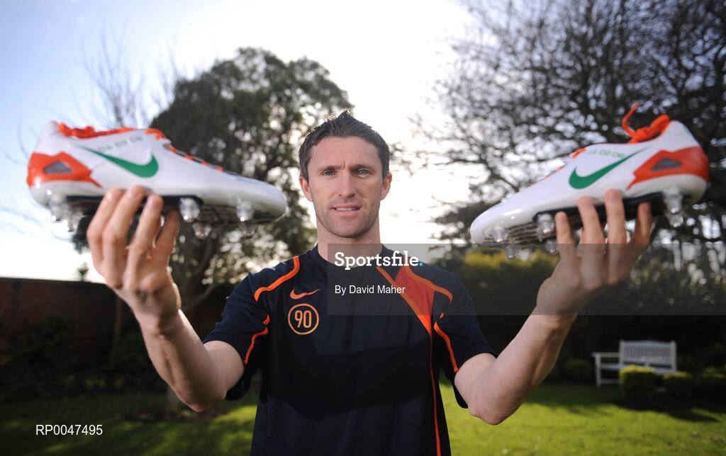 4 February 2008; Republic of Ireland captain Robbie Keane pictured with a pair of specially commissioned Republic of Ireland coloured Nike Total 90 Laser football boots which he will wear against Brazil on Wednesday the 6 February 2008. Portmarnock, Dublin. Picture credit: David Maher / SPORTSFILE