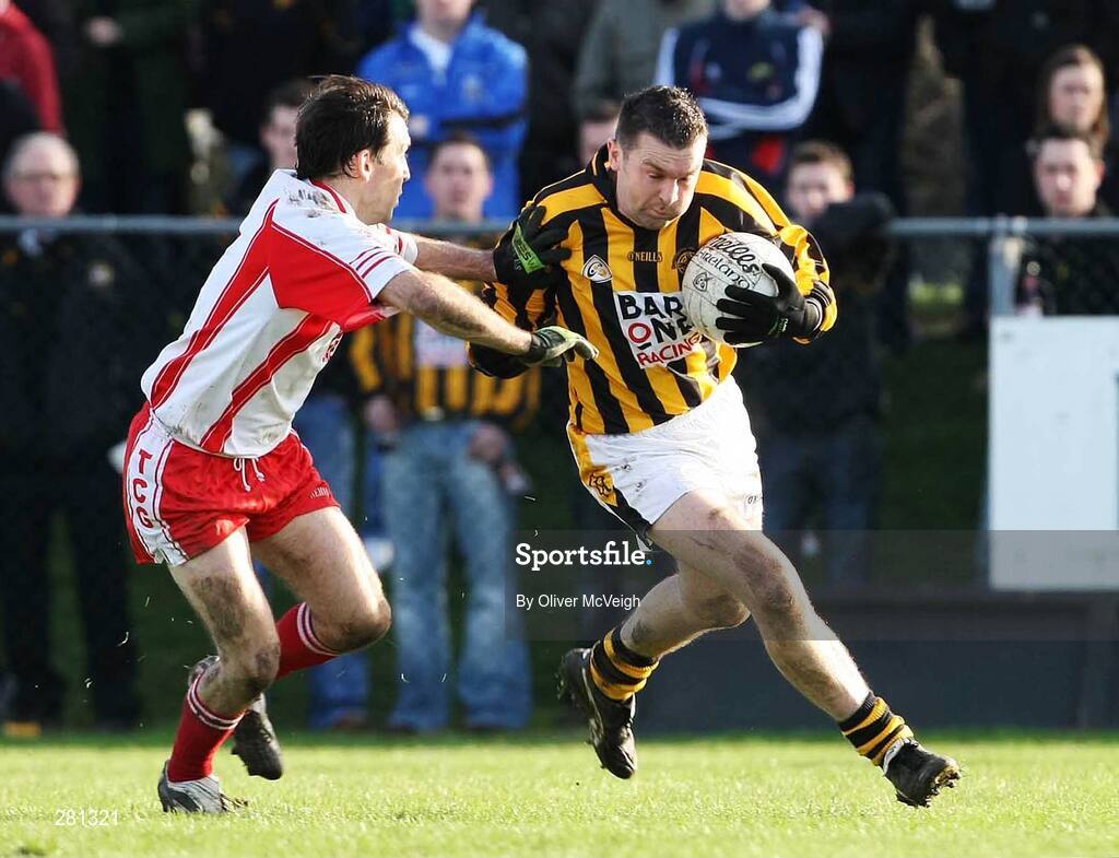 27 January 2008; Oisin McConville, Crossmaglen Rangers,  in action against Hughie Cunningham, Tir Chonaill Gaels. AIB All-Ireland Club Football Championship Quarter-Final, Tir Chonaill Gaels v Crossmaglen Rangers, Emerald Gaelic Grounds, Ruislip, London, England. Picture credit: Oliver McVeigh / SPORTSFILE