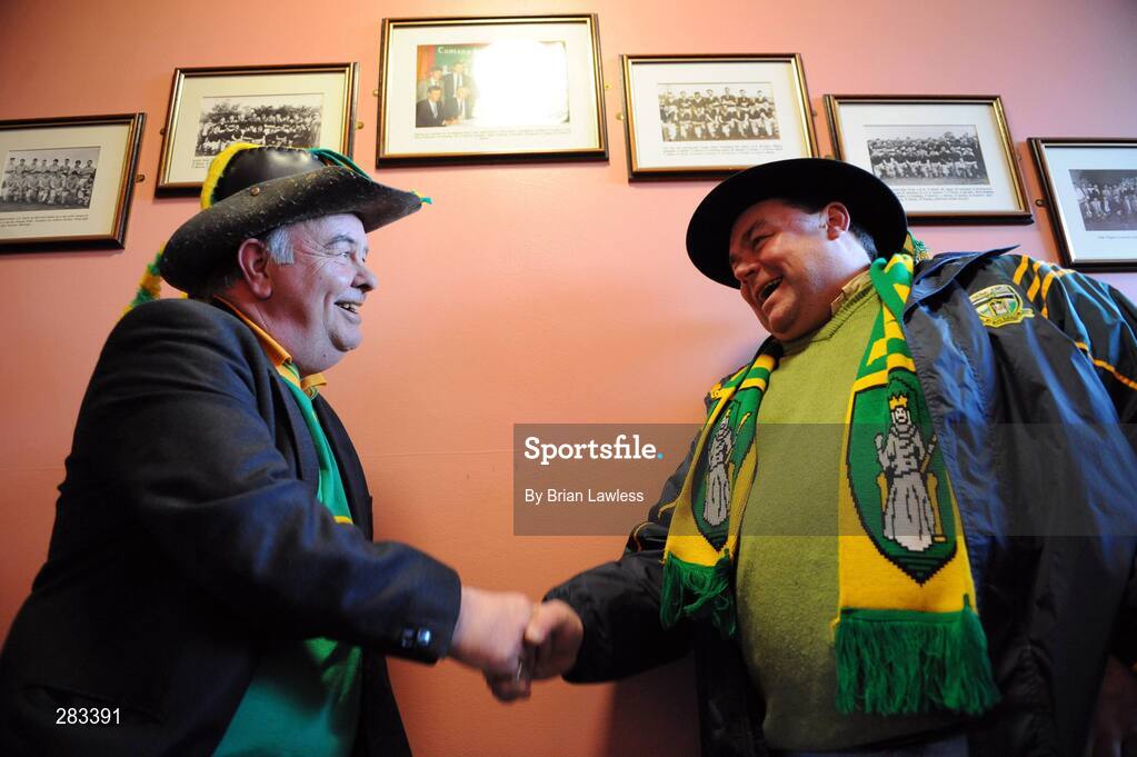 17 February 2008; Meath fans John Farrell, left, and Martin Whyte, both from Navan, 'shake on it', during half-time in the club house of St. Brigid's. Allianz National Football League, Division 2, Round 2, Roscommon v Meath, St. Brigid's, Kiltoom, Co. Roscommon. Picture credit; Brian Lawless / SPORTSFILE