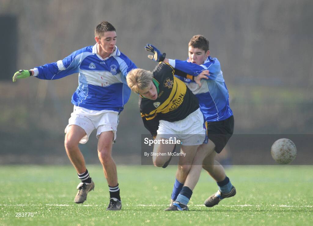 19 February 2008; Barry Keogh, Colaiste Eanna, in action against Andrew Kelly, left, and Sean Reilly, Old Bawn. Dublin Schools Senior Football B Semi-Final, Old Bawn Community School v Colaiste Eanna, UCD, Belfield, Dublin. Picture credit; Stephen McCarthy / SPORTSFILE