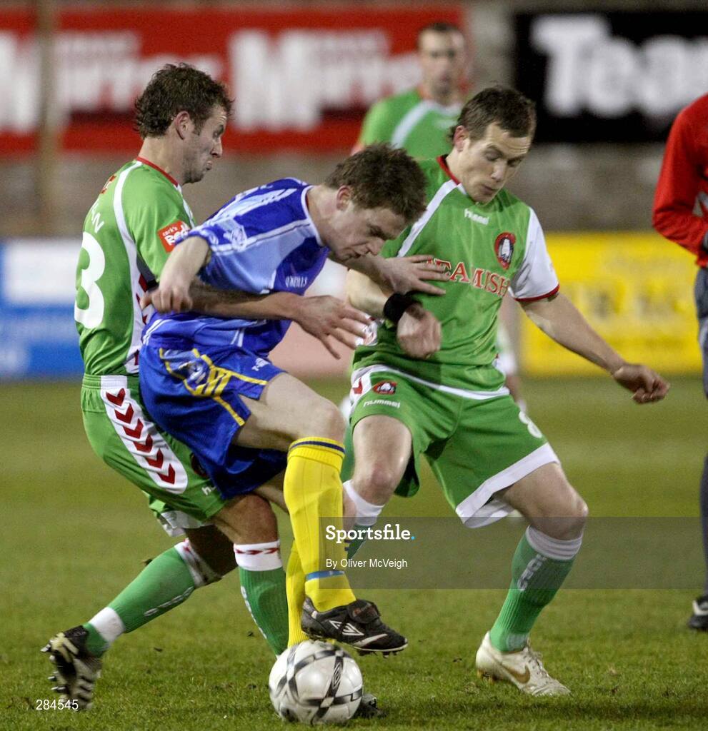 26 February 2008; Jamie Tumelty, Dungannon Swifts in action against Pat Sullivan, left, and Joe Gamble, Cork City. Setanta Cup, Dungannon Swifts v Cork City, Stangmore Park, Dungannon, Co. Tyrone. Picture credit; Oliver McVeigh / SPORTSFILE