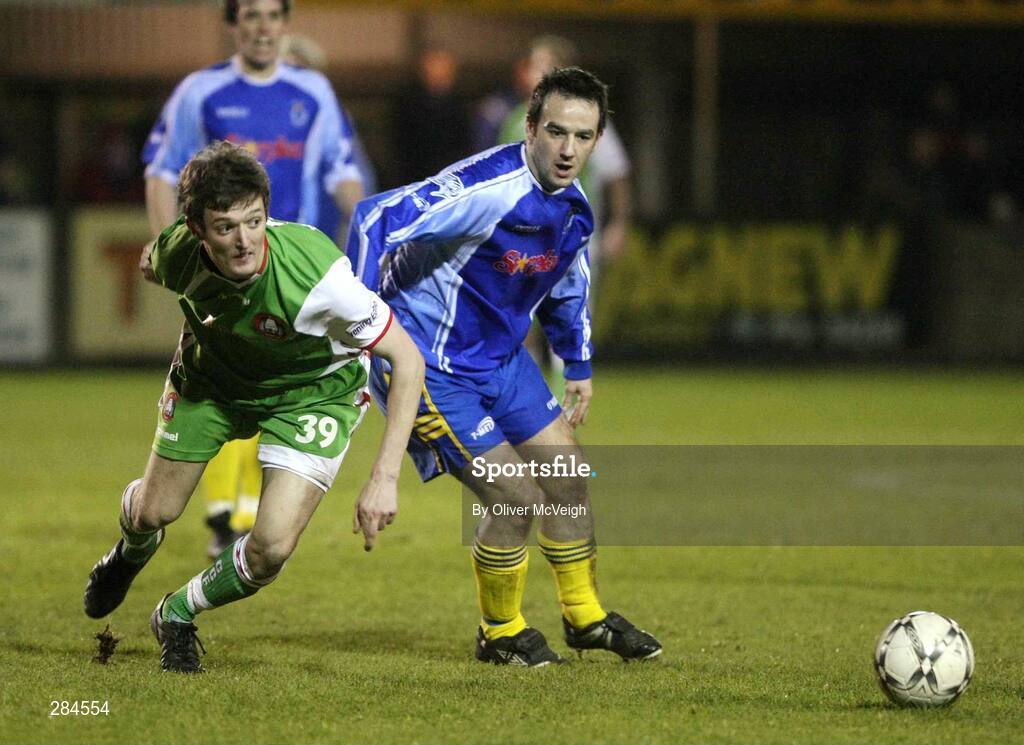 26 February 2008; Dave Mooney, Cork City, in action against Michael  Hegarty, Dungannon Swifts. Setanta Cup, Dungannon Swifts v Cork City, Stangmore Park, Dungannon, Co. Tyrone. Picture credit; Oliver McVeigh / SPORTSFILE