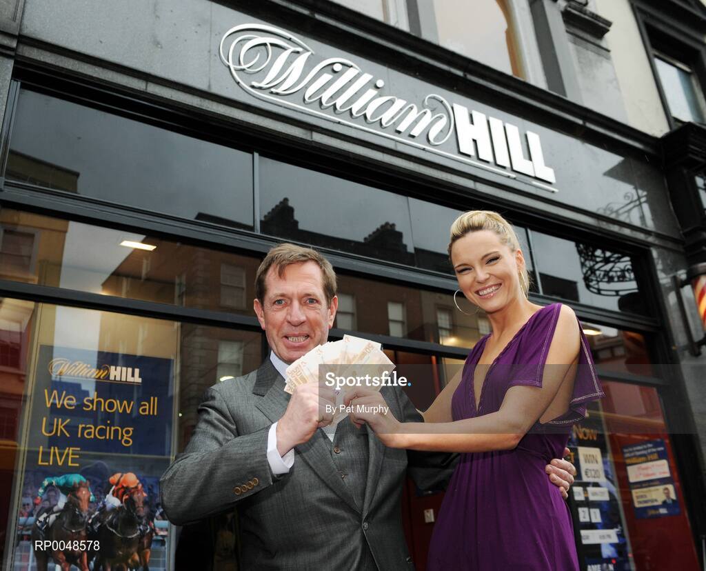 25 February 2008; Horse racing personality Derek Thompson with Miss Ireland 2006 Sarah Morrissey at the reopening of the newly refurbished William Hill Bookmakers branch on Dame Street, Dublin, are . William Hill Bookmakers, Dame Street, Dublin. Picture credit: Pat Murphy / SPORTSFILE
