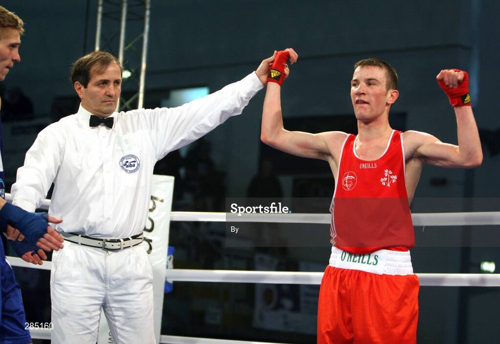 29 February 2008; Referee Teboa ZURAB, from Georgia, raises the arm of Ireland's John Joe Nevin, Cavan Boxing Club, after he defeated Maksym TRETYAK, Ukraine, to qualify for the 54Kg final of the AIBA European Olympic Boxing Qualifing Tournament. The 18 year old from Mullingar also qualifies for the Beijing Olympics. Stadio Olympico, Pescara, Italy. Picture credit: SPORTSFILE