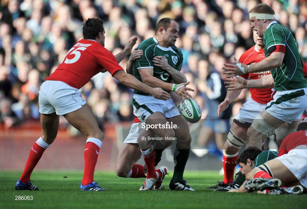 8 March 2008; Rory Best, Ireland, passes to team-mate Paul O'Connell while being tackled by Lee Byrne, Wales. RBS Six Nations Rugby Championship, Ireland v Wales, Croke Park, Dublin. Picture credit: Brendan Moran / SPORTSFILE