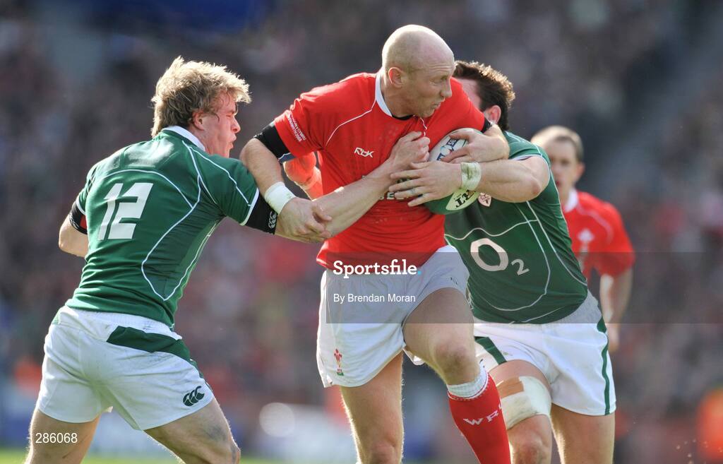 8 March 2008; Tom Shanklin, Wales, is tackled by Andrew Trimble, left, and David Wallace, Ireland. RBS Six Nations Rugby Championship, Ireland v Wales, Croke Park, Dublin. Picture credit: Brendan Moran / SPORTSFILE