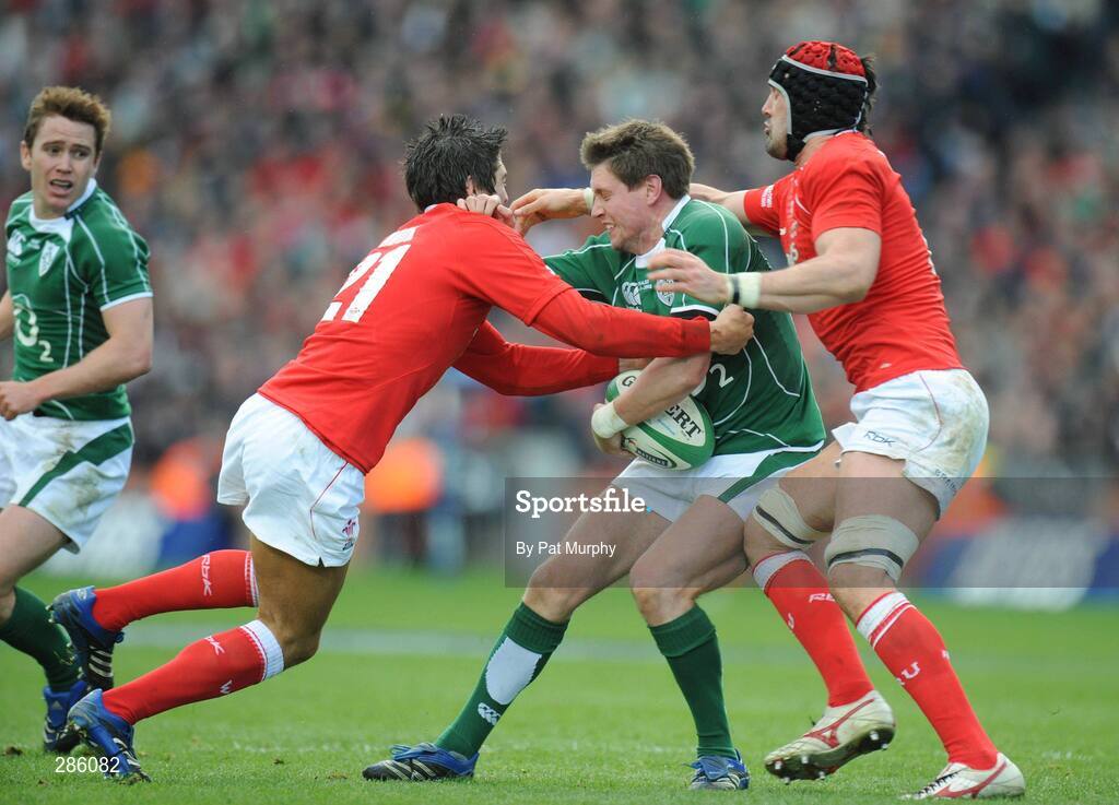 08 March 2008; Ronan O'Gara, Ireland, in action against James Hook, left, and Jonathan Thomas, Wales. RBS Six Nations Rugby Championship, Ireland v Wales, Croke Park, Dublin. Picture credit: Pat Murphy / SPORTSFILE *** Local Caption ***