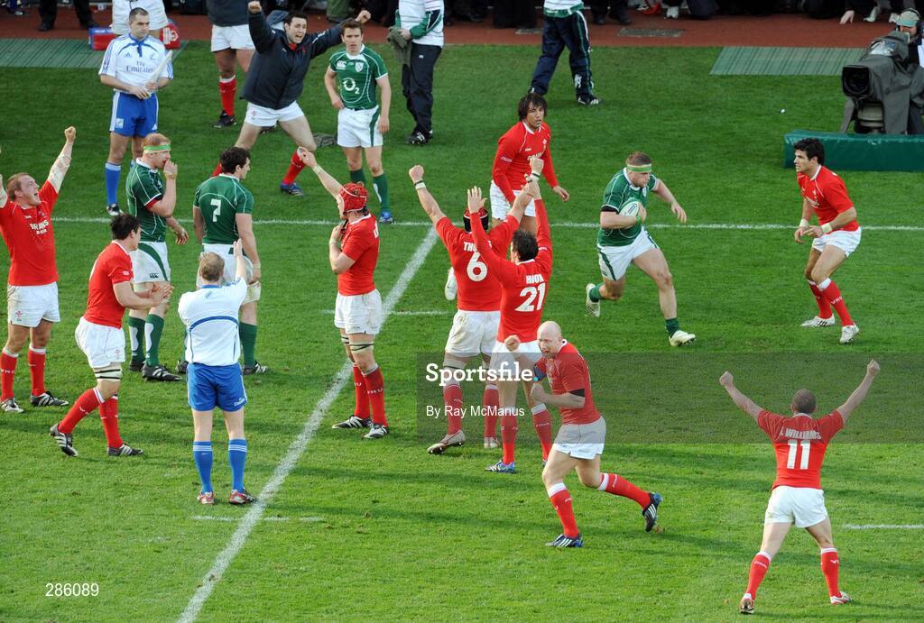 8 March 2008; Wales players celebrate as referee Wayne Barnes blows the final whistle. RBS Six Nations Rugby Championship, Ireland v Wales, Croke Park, Dublin. Picture credit: Ray McManus / SPORTSFILE