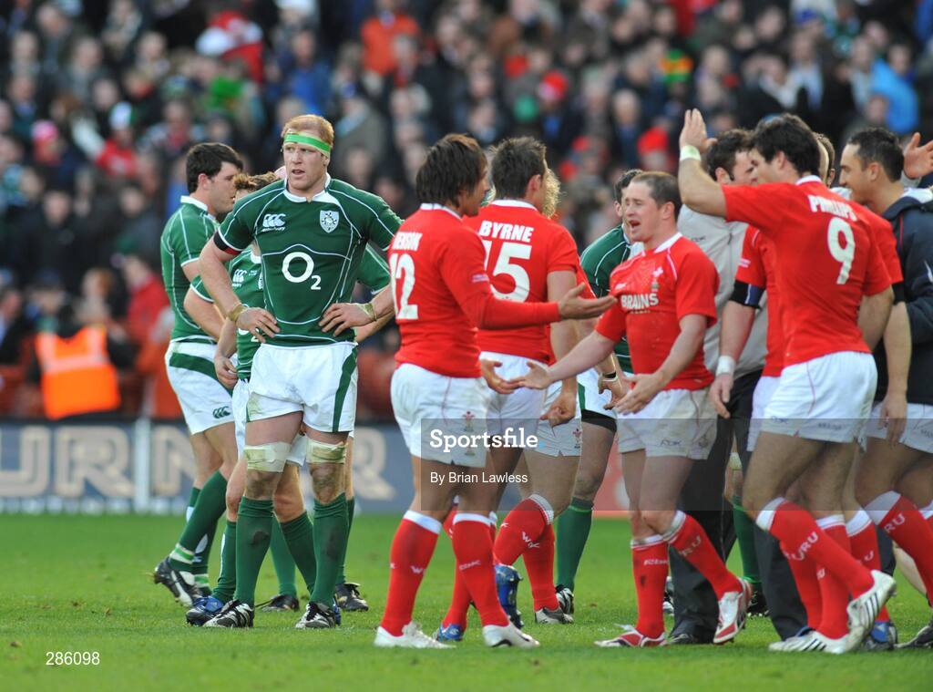 8 March 2008; Ireland's Paul O'Connell looks away as Wales players celebrate winning the Triple Crown. RBS Six Nations Rugby Championship, Ireland v Wales, Croke Park, Dublin. Picture credit: Brian Lawless / SPORTSFILE