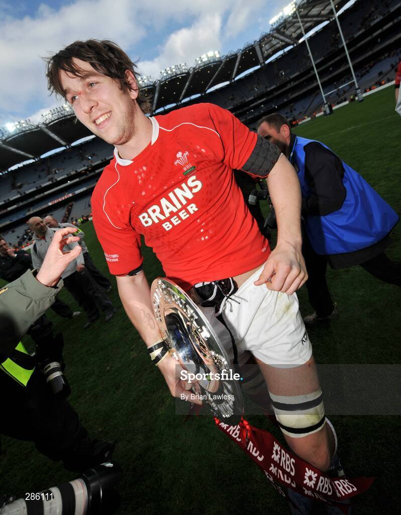 8 March 2008; Wales captain Ryan Jones leaves the pitch with the Triple Crown trophy. RBS Six Nations Rugby Championship, Ireland v Wales, Croke Park, Dublin. Picture credit: Brian Lawless / SPORTSFILE
