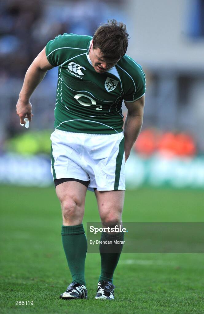 8 March 2008; Ireland captain Brian O'Driscoll holds his leg before leaving the pitch. RBS Six Nations Rugby Championship, Ireland v Wales, Croke Park, Dublin. Picture credit: Brendan Moran / SPORTSFILE
