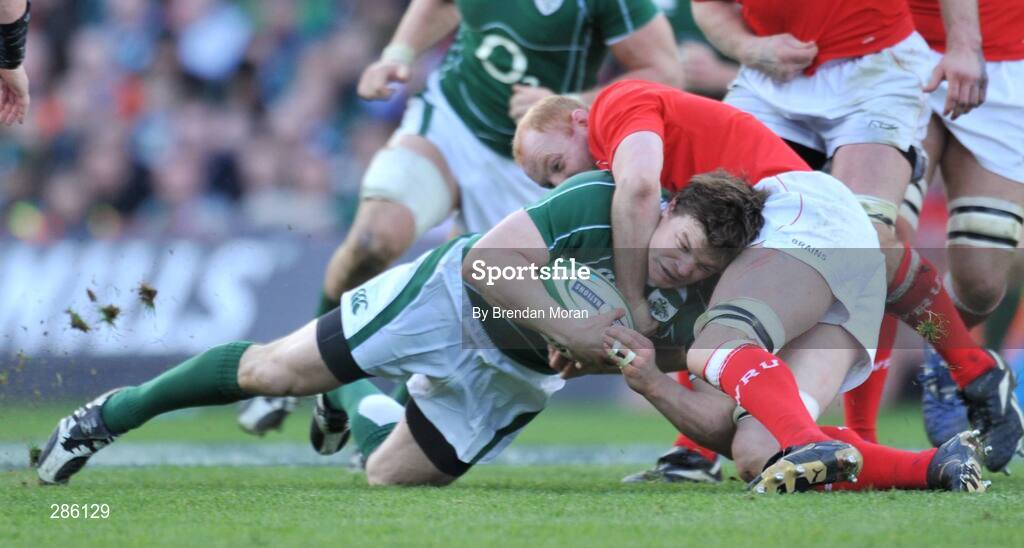8 March 2008; Brian O'Driscoll, Ireland, is tackled by Martyn Williams, Wales. RBS Six Nations Rugby Championship, Ireland v Wales, Croke Park, Dublin. Picture credit: Brendan Moran / SPORTSFILE