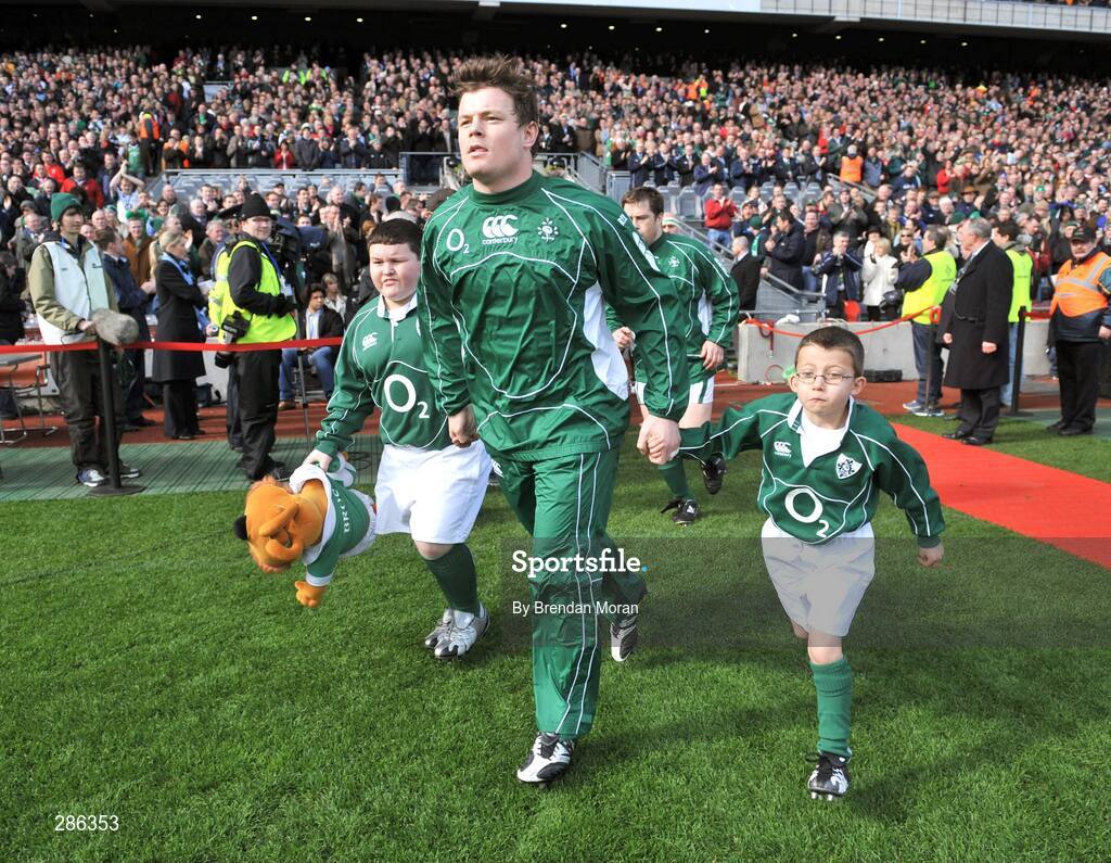 08 March 2008; Ireland captain Brian O'Driscoll and mascots Ronan Hayes, left, and Conor Murphy lead the team out before the game  RBS Six Nations Rugby Championship, Ireland v Wales, Croke Park, Dublin. Picture credit: Brendan Moran / SPORTSFILE