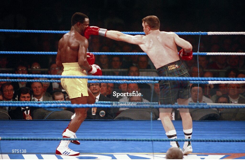 18 March 1995; Steve Collins, left, lands a left jab onto the face of Chris Eubank. WBO Super-Middleweight Title Fight, Steve Collins v Chris Eubank, Millstreet Arena, Co. Cork, Ireland. Picture credit; David Maher / SPORTSFILE