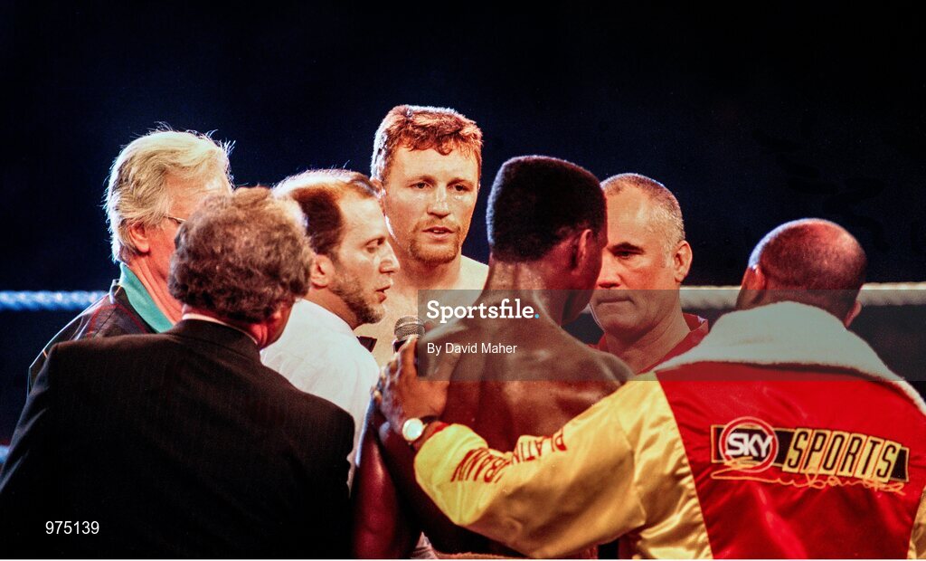 18 March 1995; Steve Collins, centre, looks on as reigning champion Chris Eubank takes issue with officials before the bout. WBO Super-Middleweight Title Fight, Steve Collins v Chris Eubank, Millstreet Arena, Co. Cork, Ireland. Picture credit; David Maher / SPORTSFILE