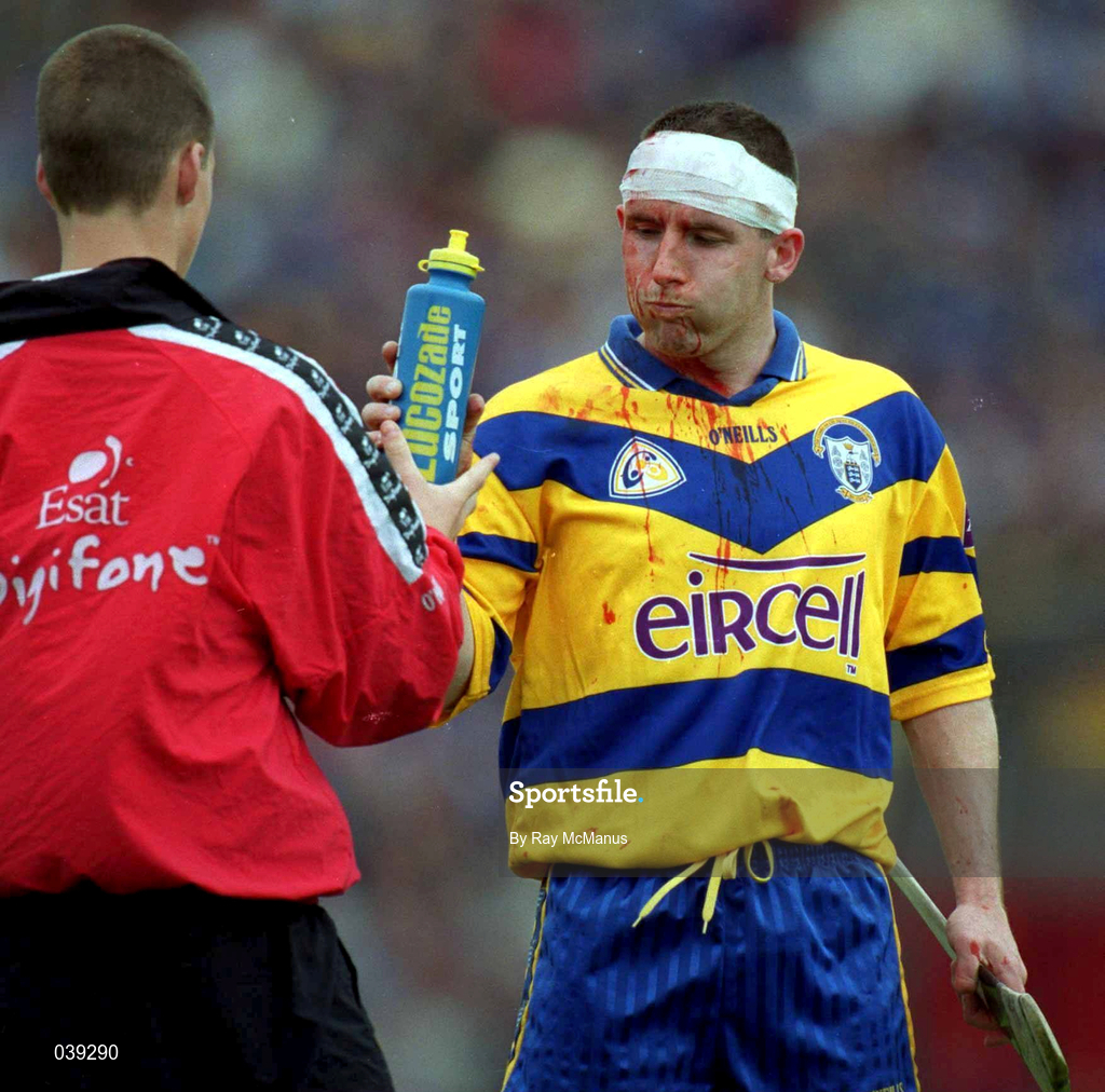 11 June 2000; Colin Lynch of Clare takes a drink after receiving treatment for a bloody headwound during the Guinness Munster Senior Hurling Championship Semi-Final match between Tipperary and Clare at Páirc Uí Chaoimh in Cork. Photo by Ray McManus/Sportsfile