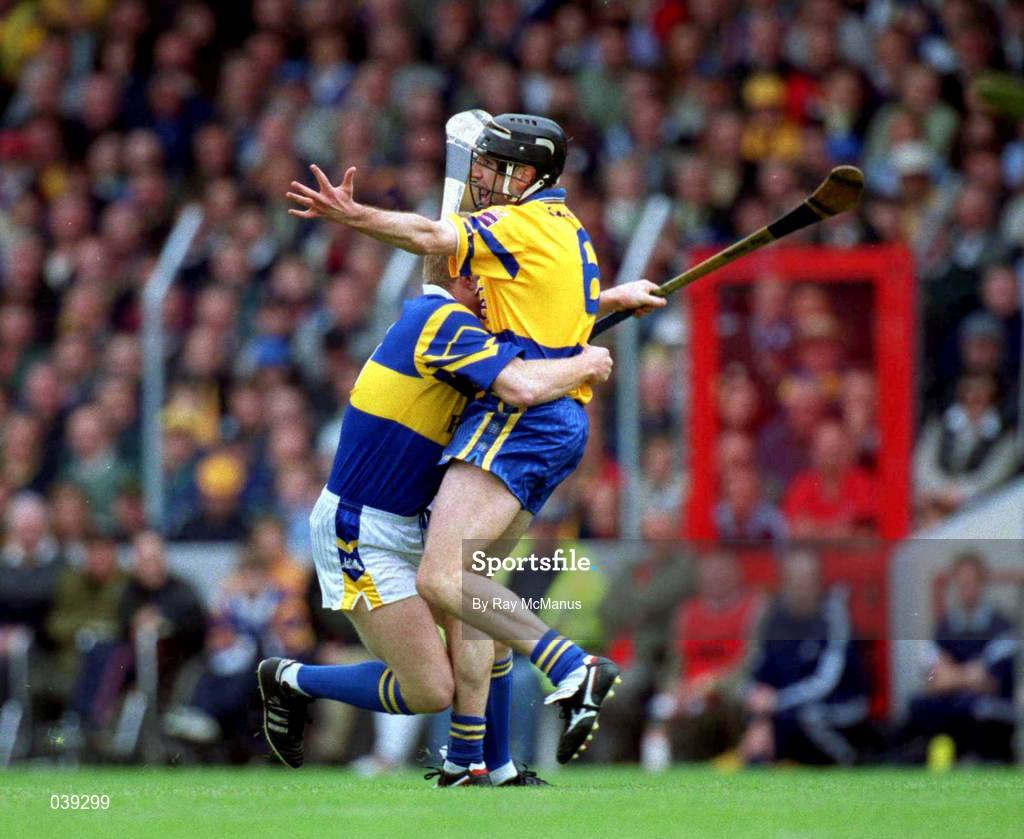 11 June 2000; Declan Ryan of Tipperary in action against Sean McMahon of Clare during the Guinness Munster Senior Hurling Championship Semi-Final match between Tipperary and Clare at Páirc Uí Chaoimh in Cork. Photo by Ray McManus/Sportsfile