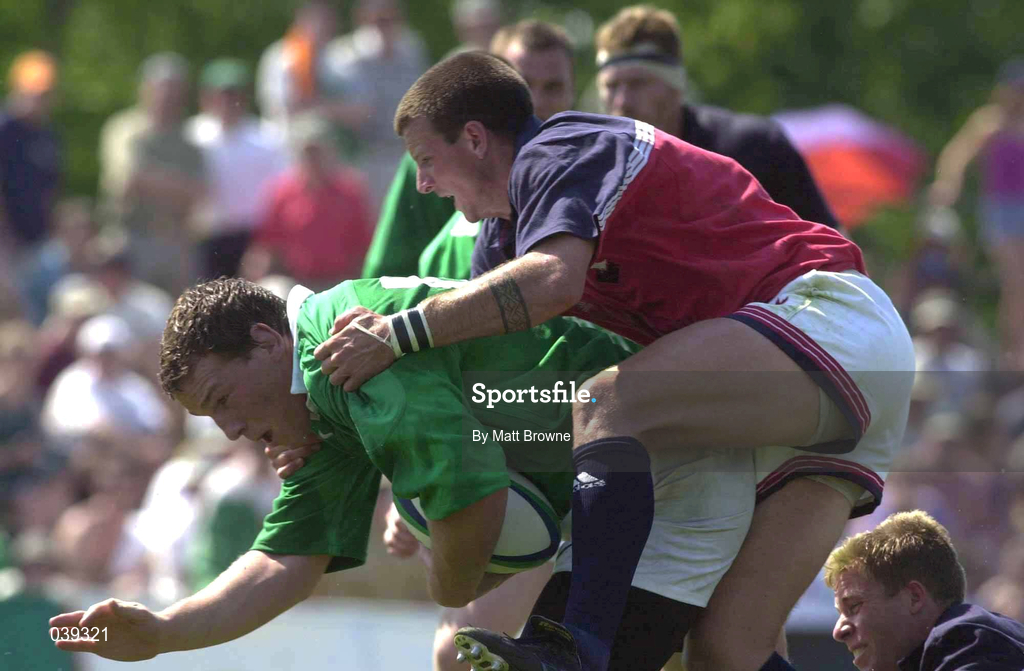 10 June 2000; Bob Casey of Ireland is tackled by Link Wilfley of USA during the Rugby International match between USA and Ireland at Singer Family Park in Manchester, New Hampshire, USA. Photo by Matt Browne/Sportsfile