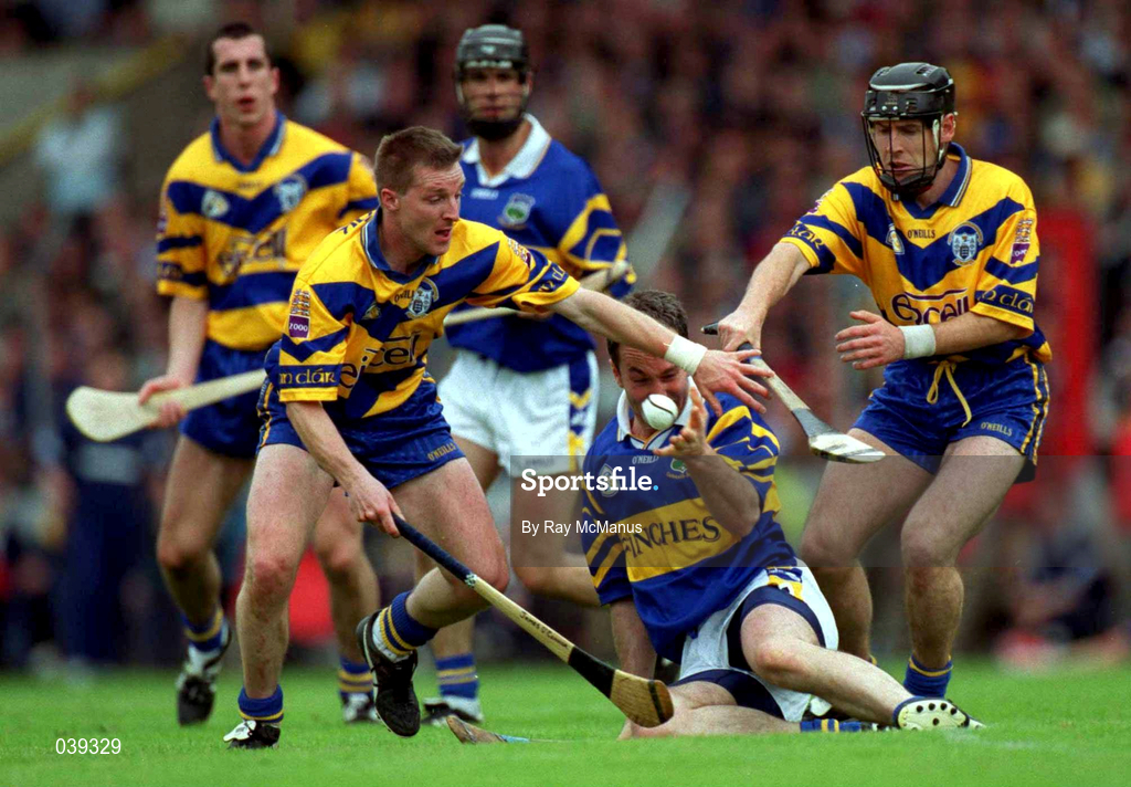 11 June 2000; Michael Ryan of Tipperary in action against Jamesie O'Connor of Clare during the Guinness Munster Senior Hurling Championship Semi-Final match between Tipperary and Clare at Páirc Uí Chaoimh in Cork. Photo by Ray McManus/Sportsfile