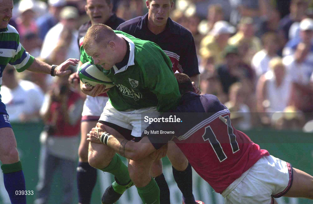 10 June 2000; Frank Sheahan of Ireland is tackled by Malakai Delai of USA during the Rugby International match between USA and Ireland at Singer Family Park in Manchester, New Hampshire, USA. Photo by Matt Browne/Sportsfile